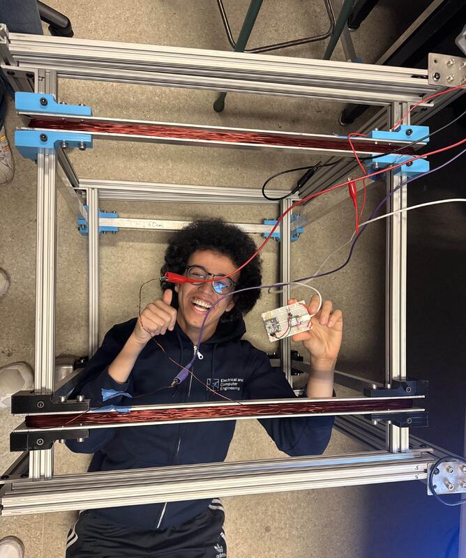 Rachad experimenting with a hardware test rig