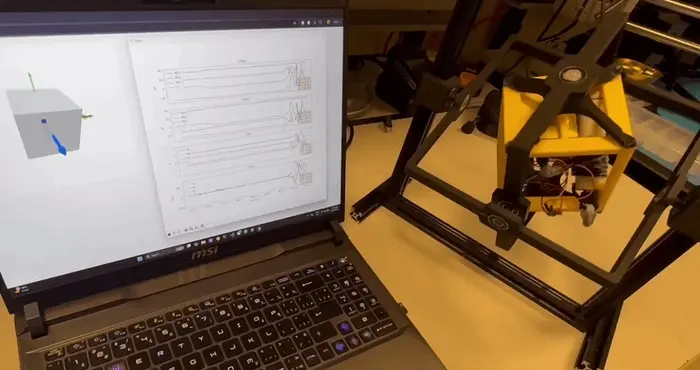 Three-axis gimbal testbed with laptop-side sensor plots and attitude visualization