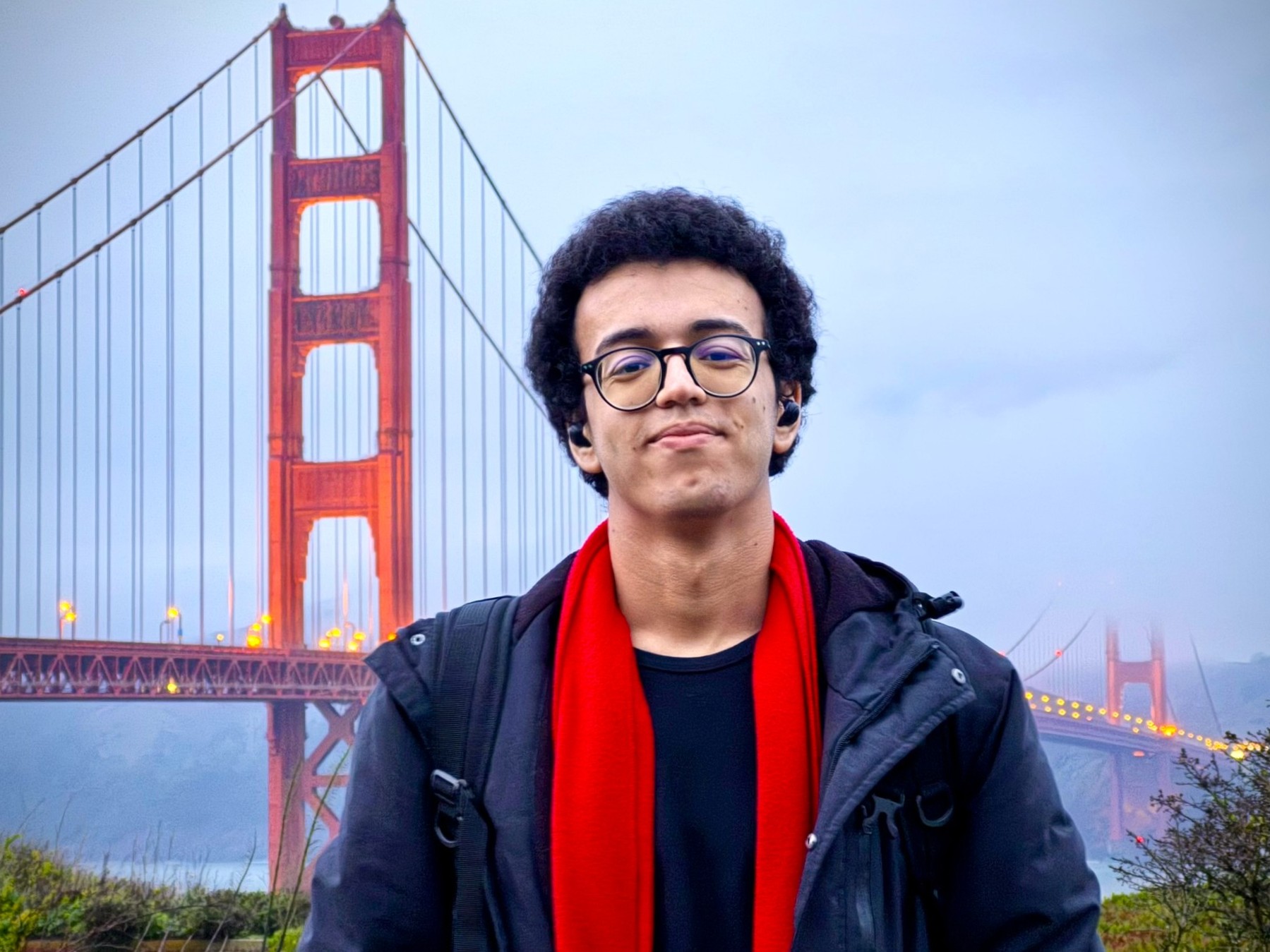 Illustration of Rachad beside the Golden Gate Bridge
